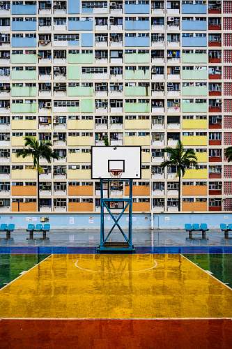 basketball white basketball court beside building basketball court